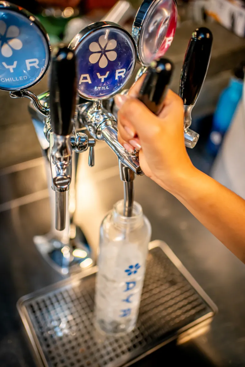 AYR Water integrated tap filling a reusable bottle