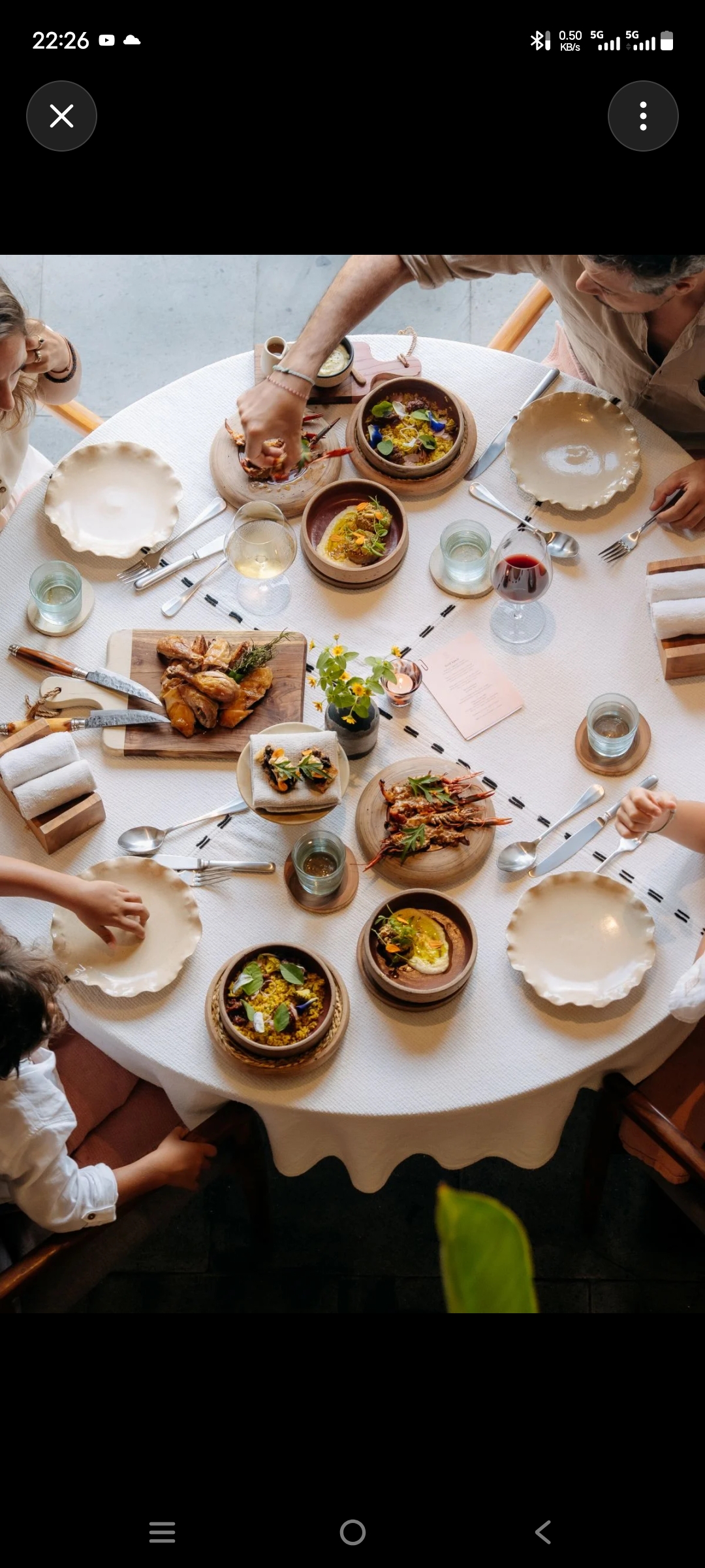 Fine-dining table service in a farm-to-fork restaurant setting