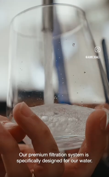 AYR Water reusable glass bottle hospitality presentation